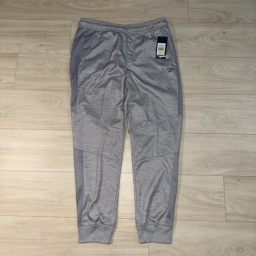 New Under Armour Mens Loose Fit Gray Athletic Pants Size Large Foul line Fleece